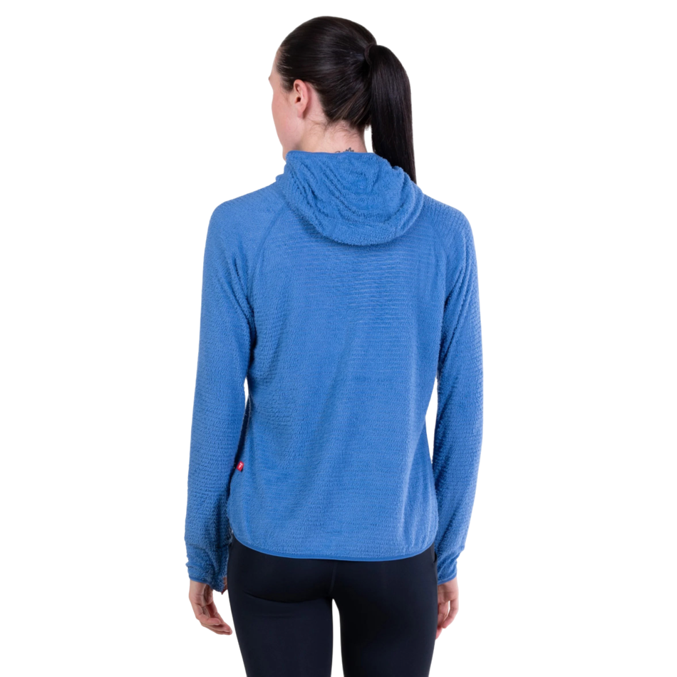 Back view of a woman wearing a blue Ronhill Tech Winter Primaloft Hoodie from Up & Running with a textured finish.