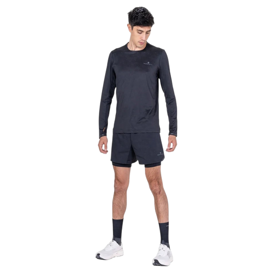 Up & Running Ronhill men's black long-sleeved running tee with reflective details worn by a male model