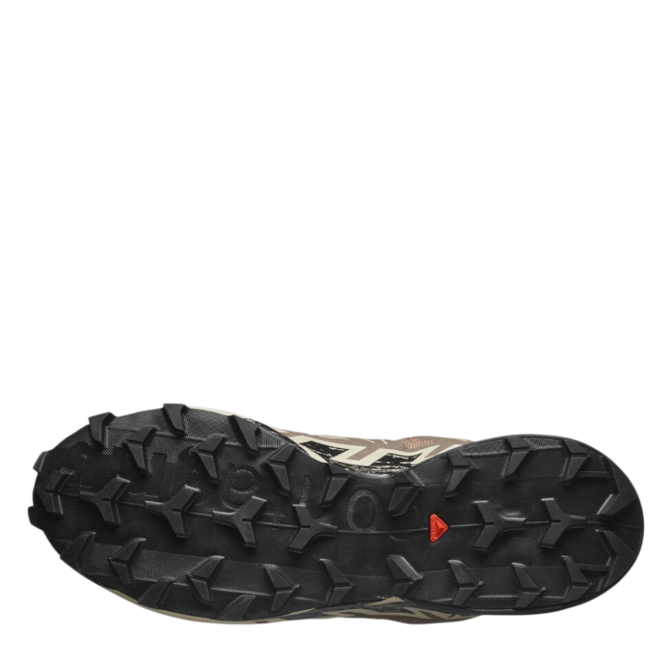 Up & Running Salomon Speedcross 6 trail running shoe outsole in natural, black, and almond milk with deep mud lugs