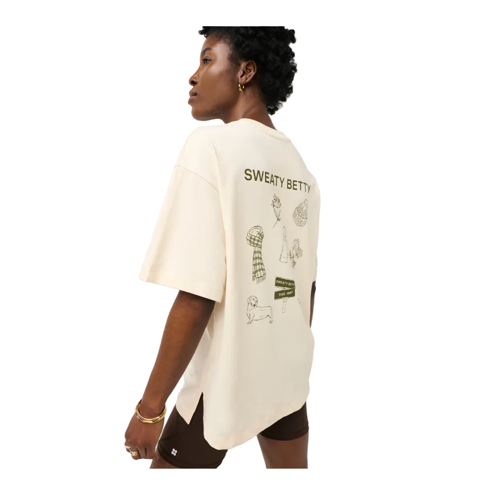 Sweaty Betty British Heritage Graphic T-Shirt in Creme Beige Bracken Green, back view