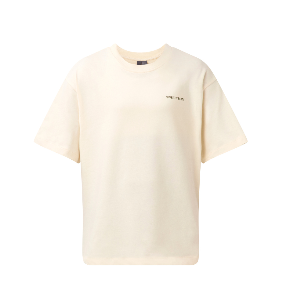 Sweaty Betty British Heritage Graphic T-Shirt in Creme Beige Bracken Green Graphic Script Wordmark AW26