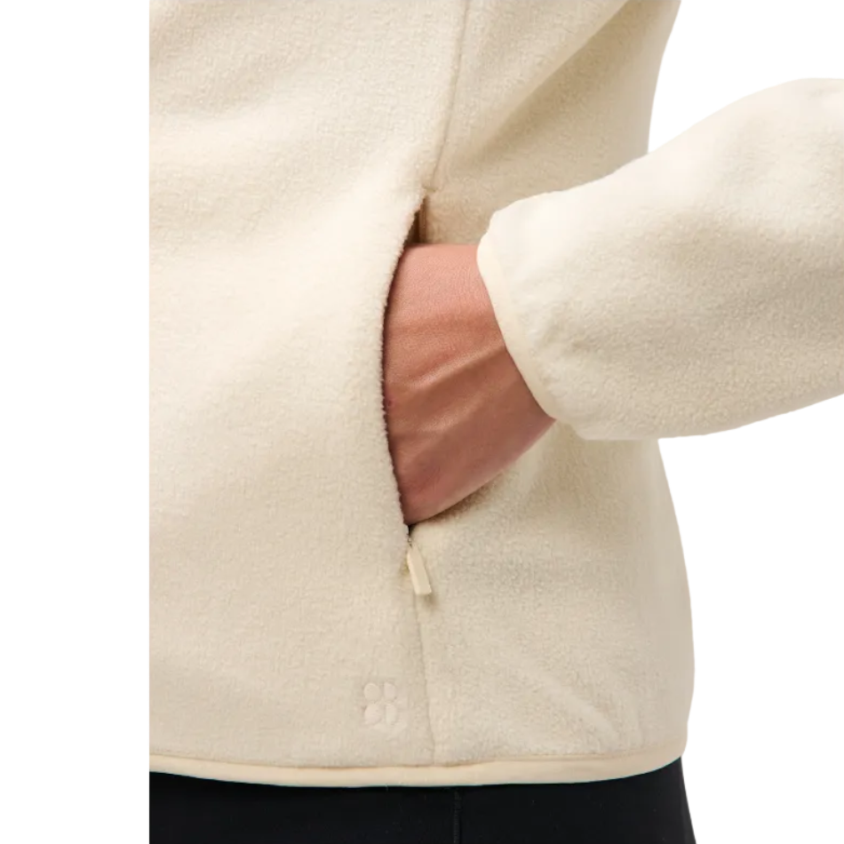 Sweaty Betty Evergreen Fleece Zip Up in Clay Beige, pocket view