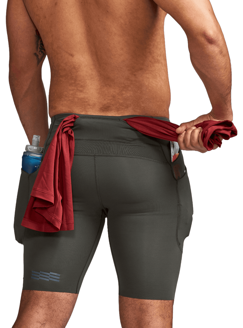 Janji Clothing Janji Men's 8 inch Trail Half Tight in Carbon AW24 - Up and Running