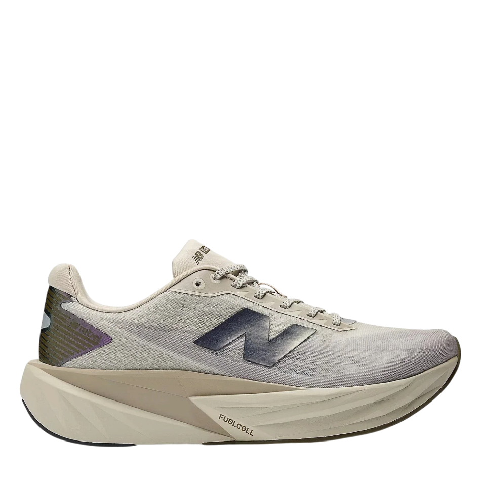 Up & Running New Balance FuelCell Rebel v5 running shoes in shipyard, arid stone, and silver metallic mesh.
