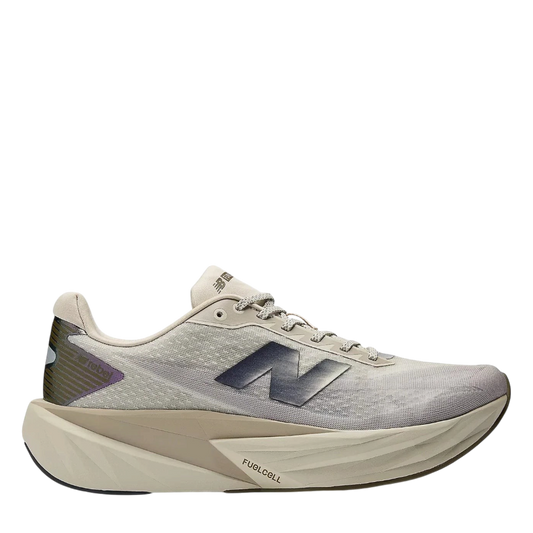 Up & Running New Balance FuelCell Rebel v5 running shoes in shipyard, arid stone, and silver metallic mesh.