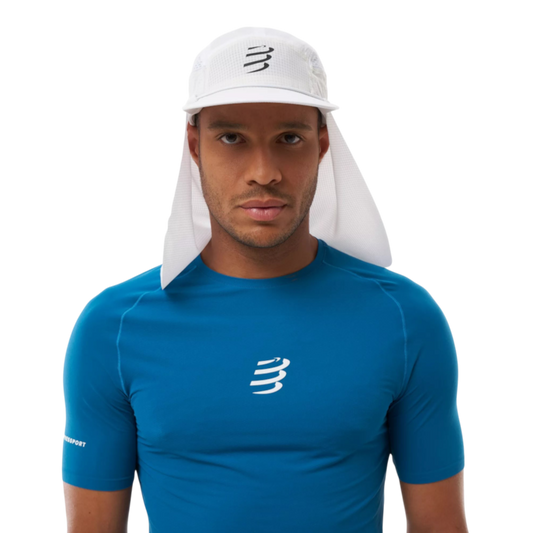 Up & Running Compressport white racing cap with removable neck protector worn by a male runner
