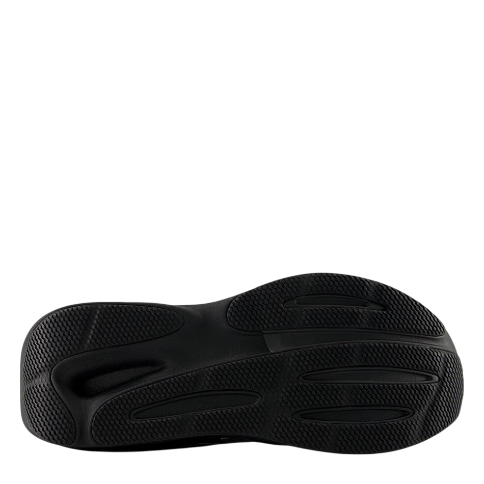 Up & Running New Balance 860 V15 running shoe black rubber outsole with textured grip and rocker geometry design