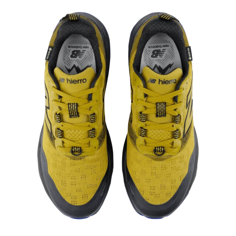 Up & Running New Balance Hierro v9 GORE-TEX trail running shoes in basil oil and black, top-down view.