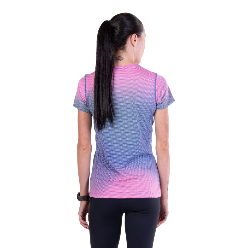 Back view of a woman wearing an Up & Running Ronhill Tech Golden Hour short-sleeved running tee in orchid glow.